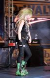 th_47315_celebrity_paradise.com_TheElder_AvrilLavigne2011_05_28_performsliveinconcertatTropicanaFieldinStPeter4_122_520lo.jpg